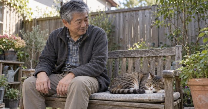 Ten Animal-Inspired Life Lessons: Reflection Without Myths or Stereotypes Man quietly observing his relaxed cat resting beside him on a backyard bench.