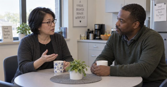 Two coworkers calmly discussing a request in an ordinary office break room.
