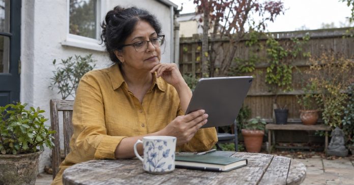 Choosing a Psychic: Purpose, Service Terms and the Option to Decline Woman considering a reading service offer on her tablet in a modest backyard.
